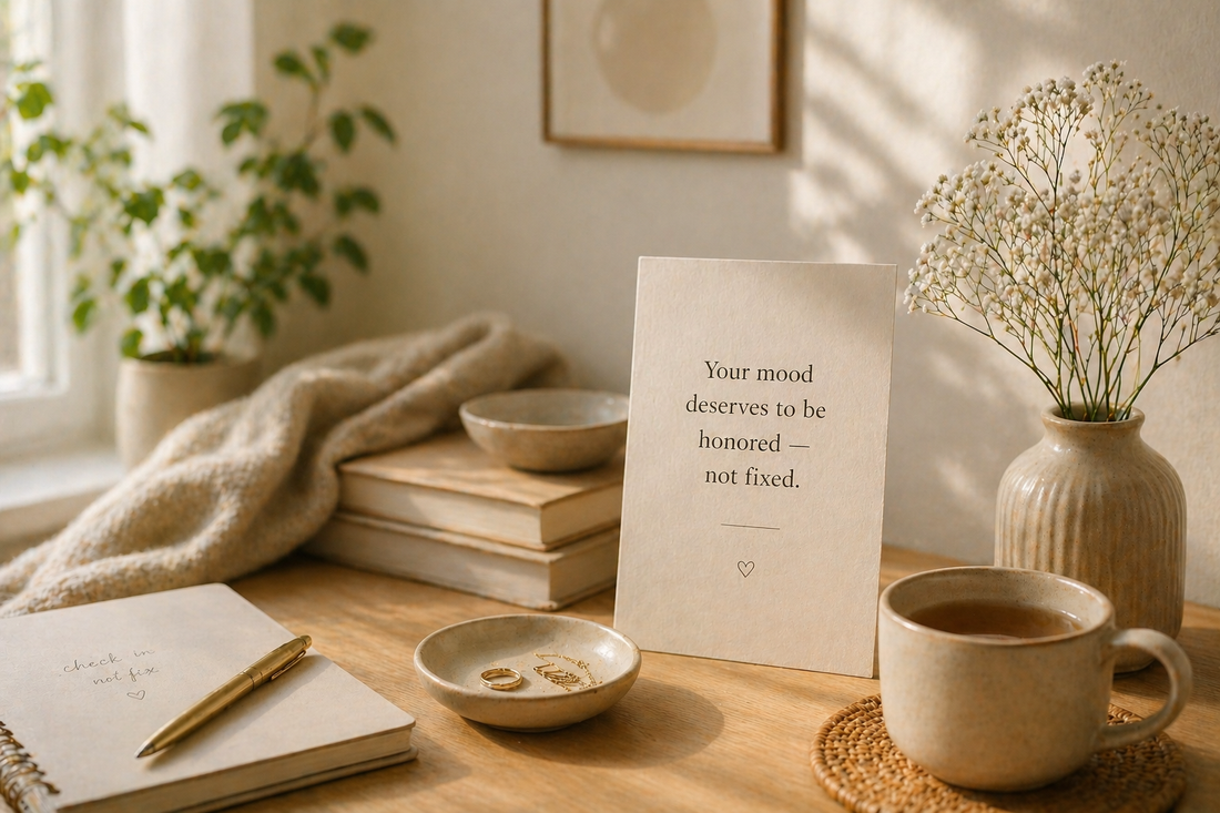 Sunlit scene with journal, tea, and affirmation about honoring your mood